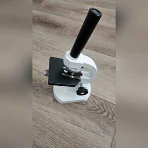 White and Black Microscope